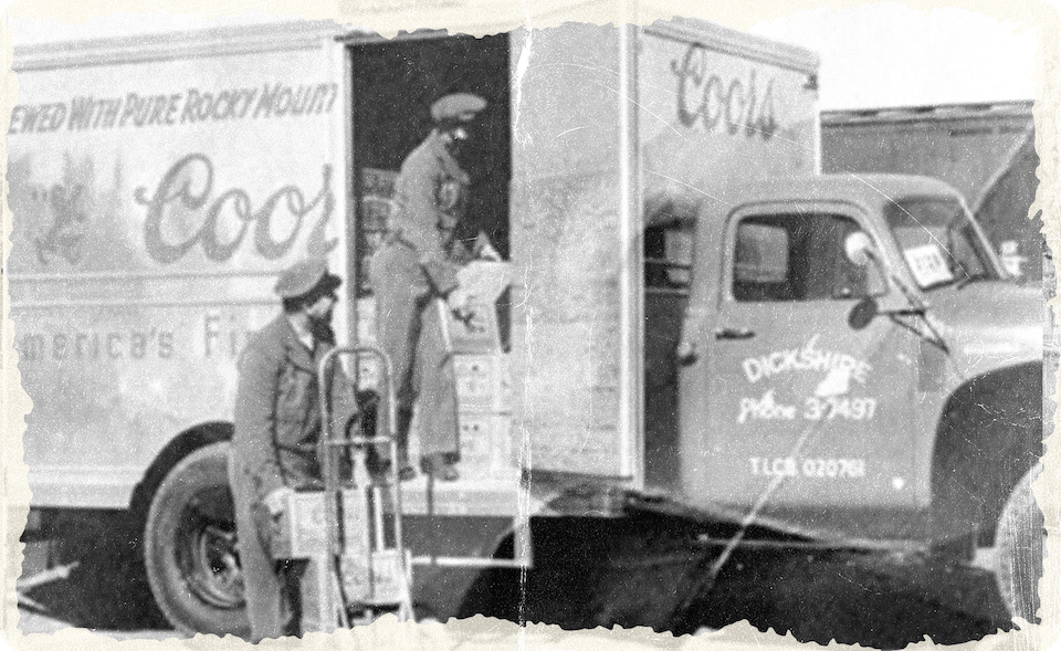 Two man on a Coors truck